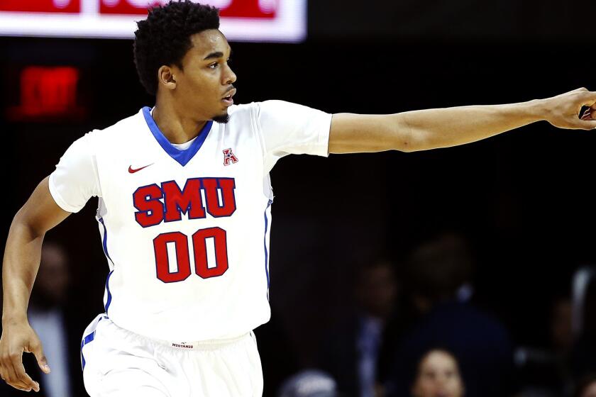 SMU forward Ben Moore (00) celebrates after scoring against Central Florida in the first half Sunday.