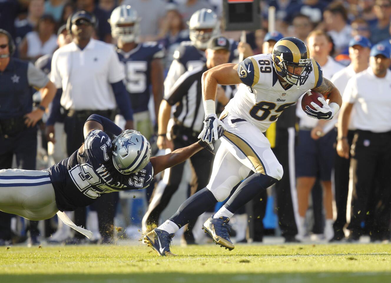 Rams tight end Tyler Higbee runs for a first down after a reception in the second quarter.
