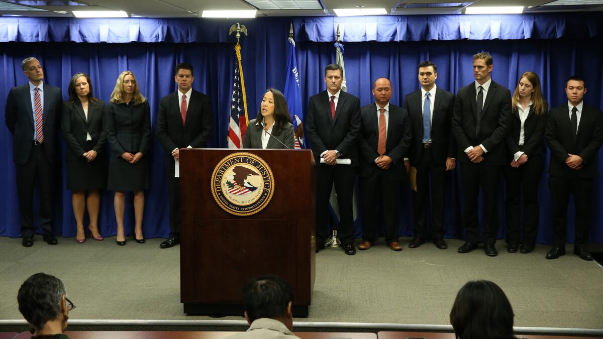 Acting U.S. Atty. Stephanie Yonekura speaks at a news conference Thursday on the indictment of former Los Angeles County Undersheriff Paul Tanaka.