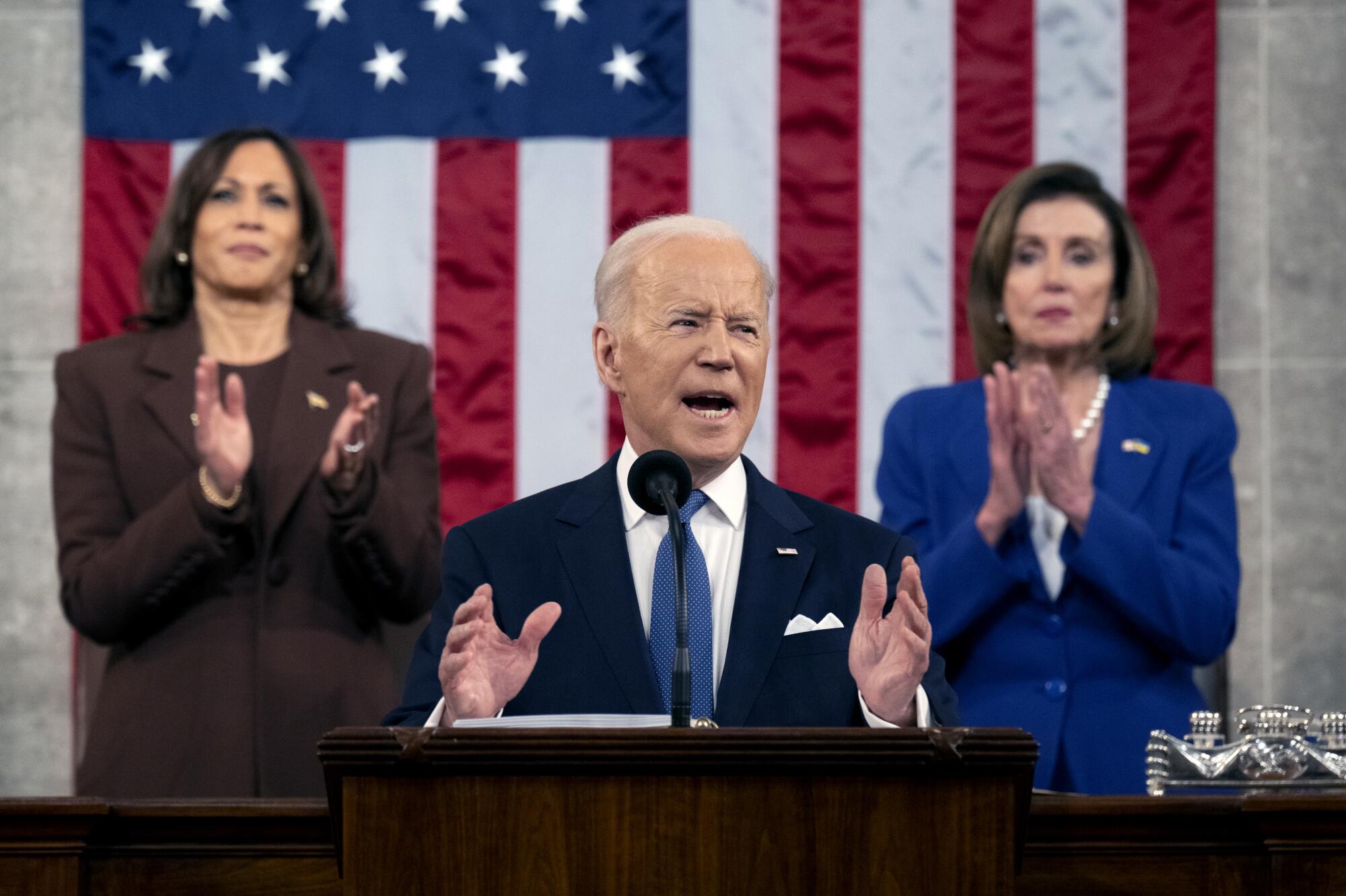 President Biden is applauded during his State of the Union address. 