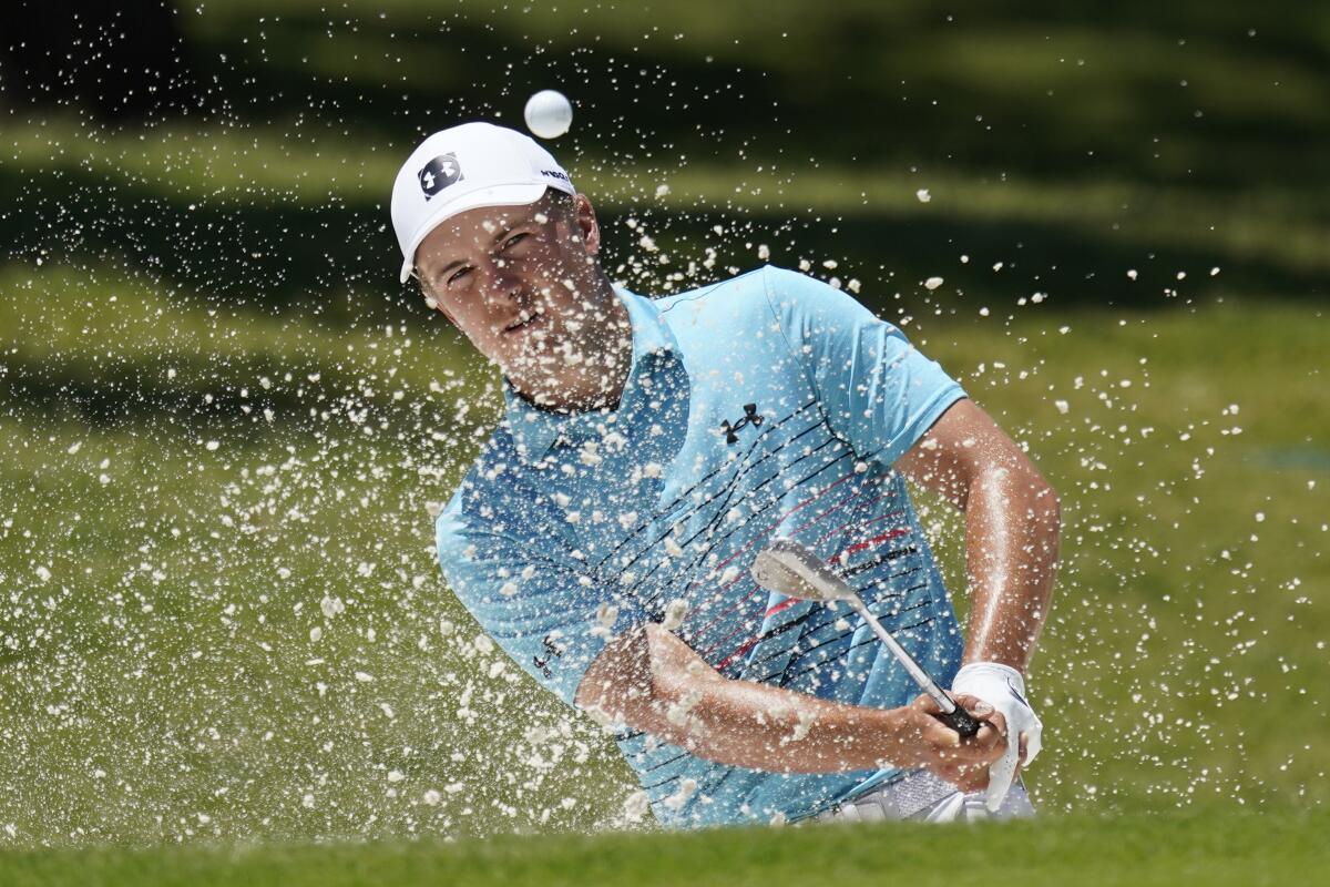 Jordan Spieth hits out of a bunker in the third round of the Charles Schwab Challenge on June 13, 2020.