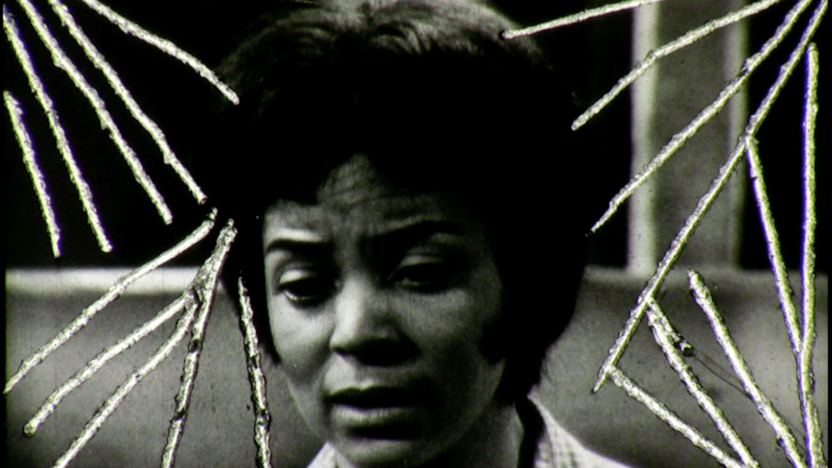A black-and-white image shows performer Ruby Dee with hand-drawn lines surrounding her face