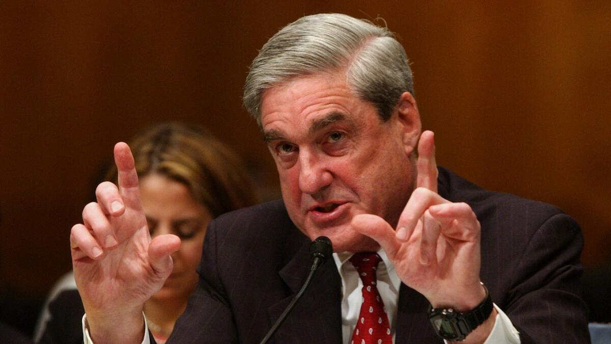 Then-FBI Director Robert Mueller testifies on Capitol Hill on March 5, 2008.