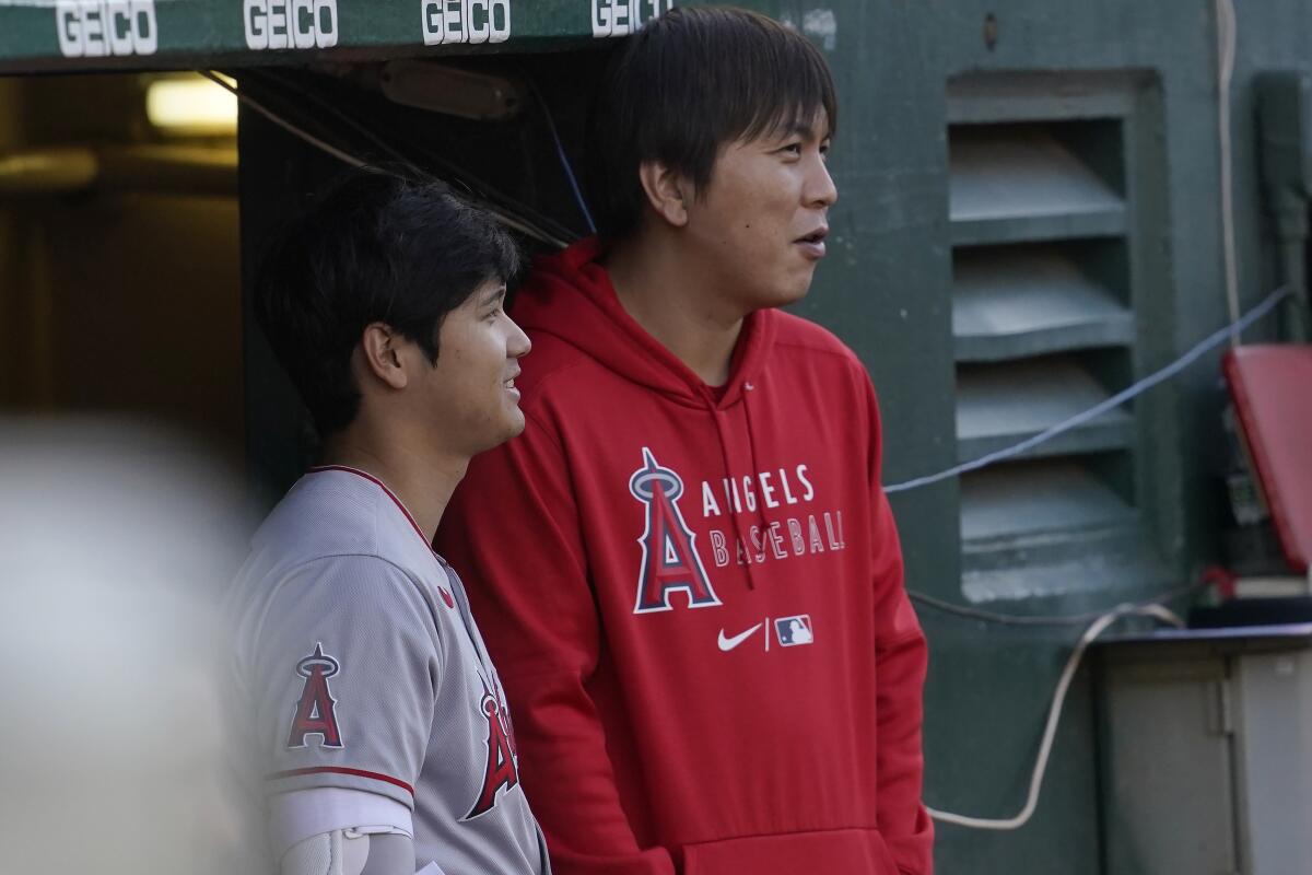 Shohei Ohtani's interpreter, Ippei Mizuhara, will catch for the two-way star during the Home Run Derby. (AP Photo/Jeff Chiu)