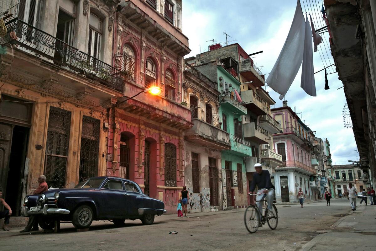 Parts of Old Havana in Cuba are being restored for foreign tourists, but others remain the same.