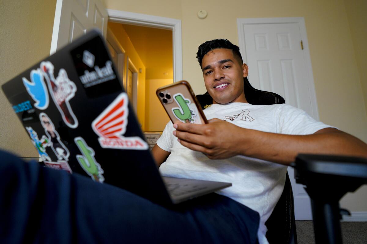 Jesus Morales working from his home office