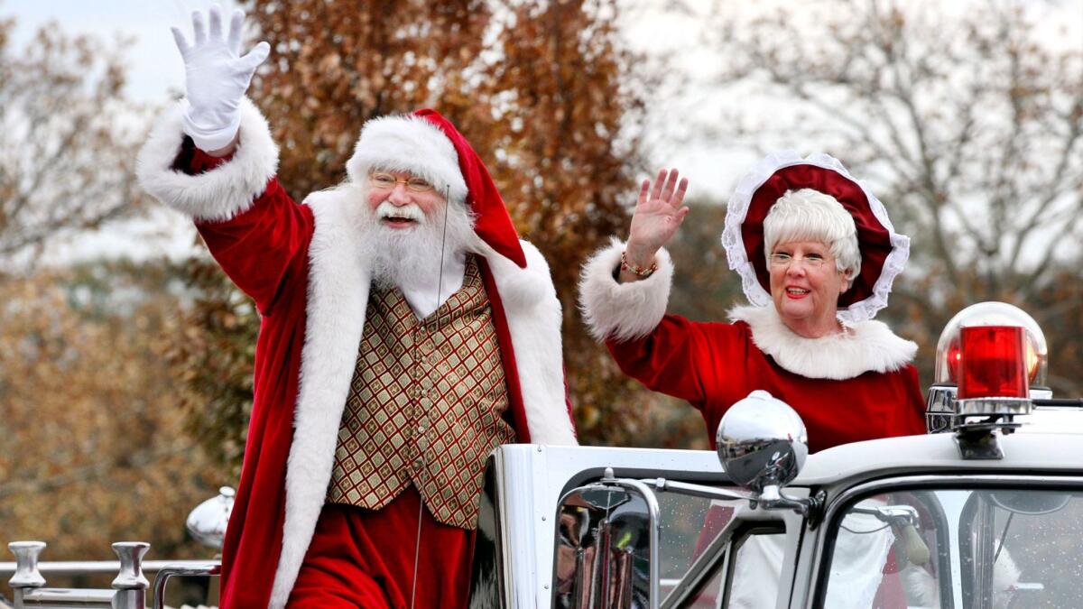 Santa Claus and Mrs. Claus arrived riding atop a fire engine during a celebration in Winchester, Va. on Nov. 18.