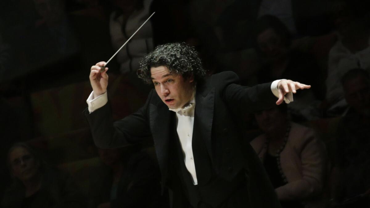 Gustavo Dudamel conducts the Los Angeles Philharmonic in John Adams' "City Noir" at Walt Disney Concert Hall on March 12. It was a jazzier interpretation than when he led its debut in 2009.