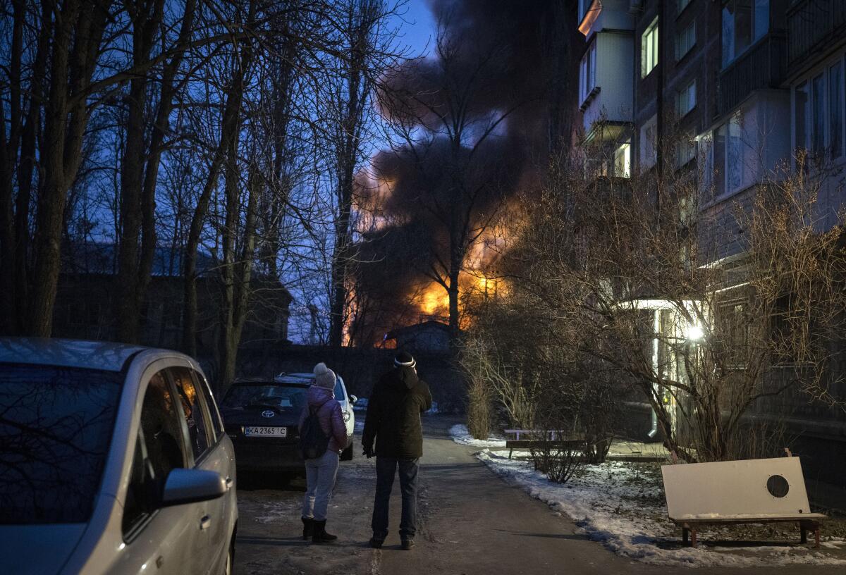 Smoke and flames billow after a drone strike in Kyiv, Ukraine
