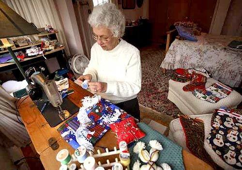 Ethel Pedrick, whose son Charles, who was killed while loading a wounded comrade onto a helicopter in Vietnam, sews 150 Christmas stockings every year on the machine in her Alameda home; on Dec. 28, she starts the next years batch.