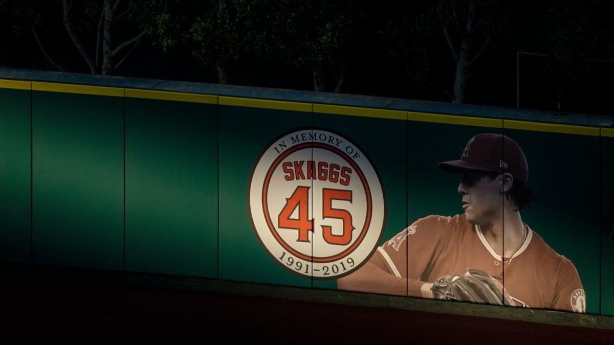 A tribute to the late Tyler Skaggs adorns the outfield wall at Angel Stadium. 
