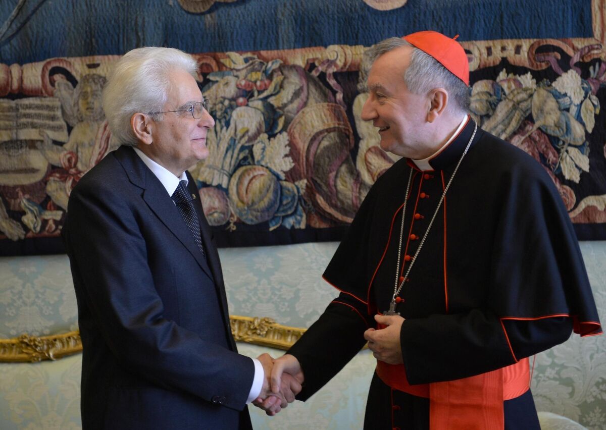 Italian President Sergio Mattarella, left, with Vatican Secretary of State Cardinal Pietro Parolin at the Vatican.