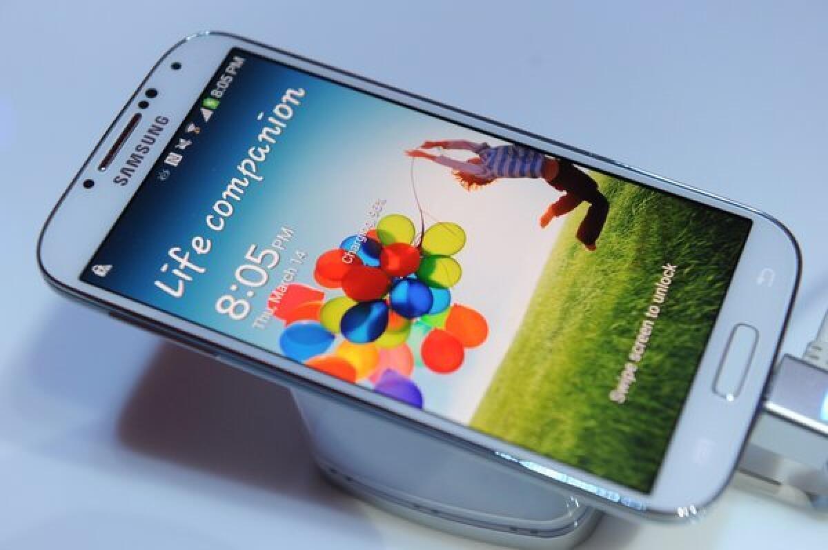 A new Pew survey found that the percentage of people who have Internet access at home rises from 70% to 80% when factoring in smartphones. Pictured, the Samsung Galaxy S4 smartphone.