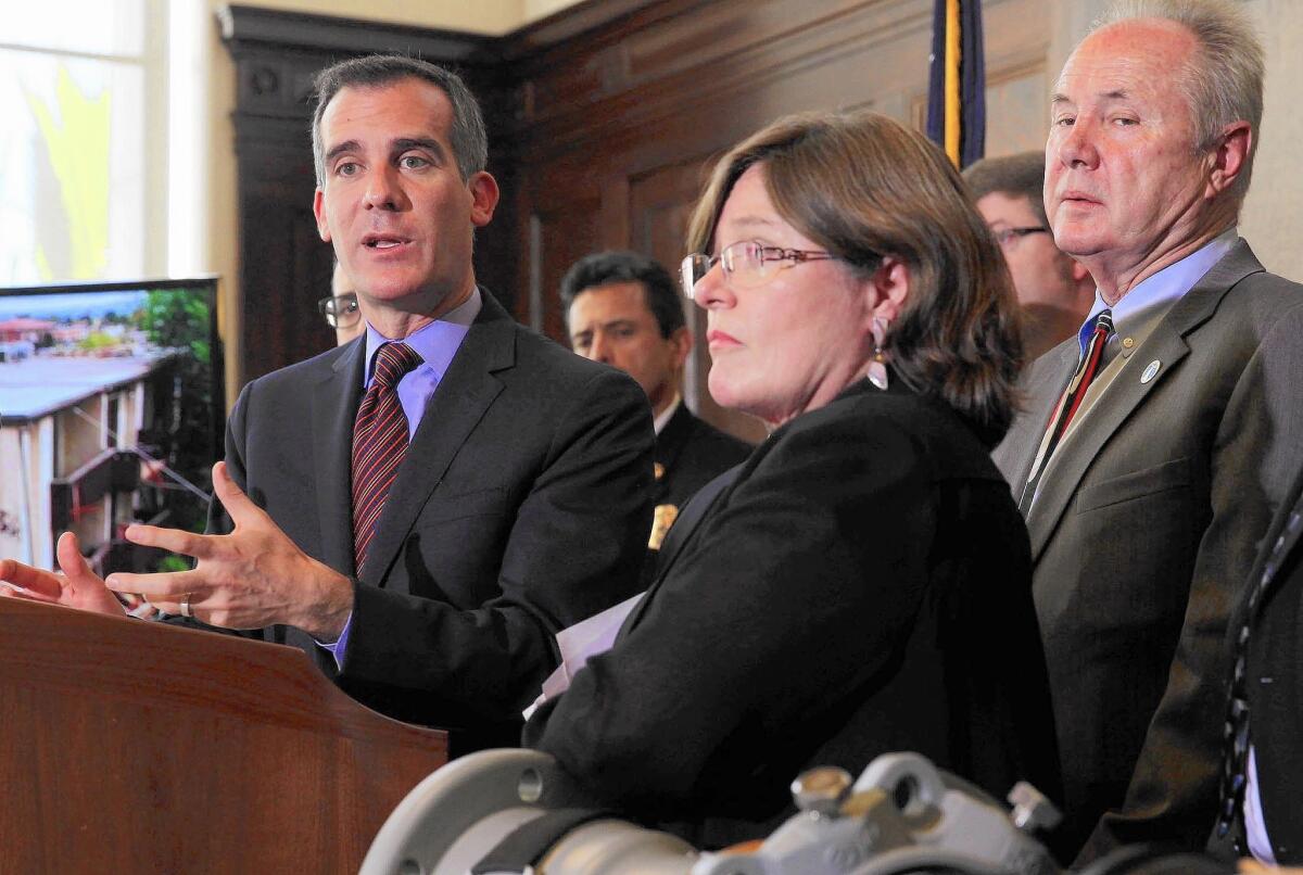 Mayor Eric Garcetti , left, proposed the most ambitious seismic safety regulations in California history Monday. U.S. Geological Survey seismologist Lucy Jones, right, has been acting as Garcetti’s science advisor on this effort.