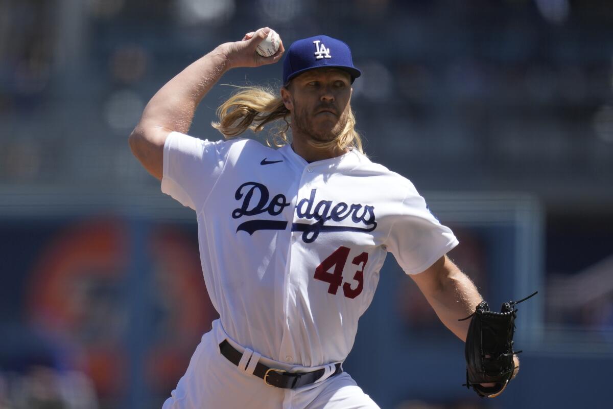 Los Angeles Dodgers starting pitcher Noah Syndergaard (43) throws during the first inning of a baseball game.