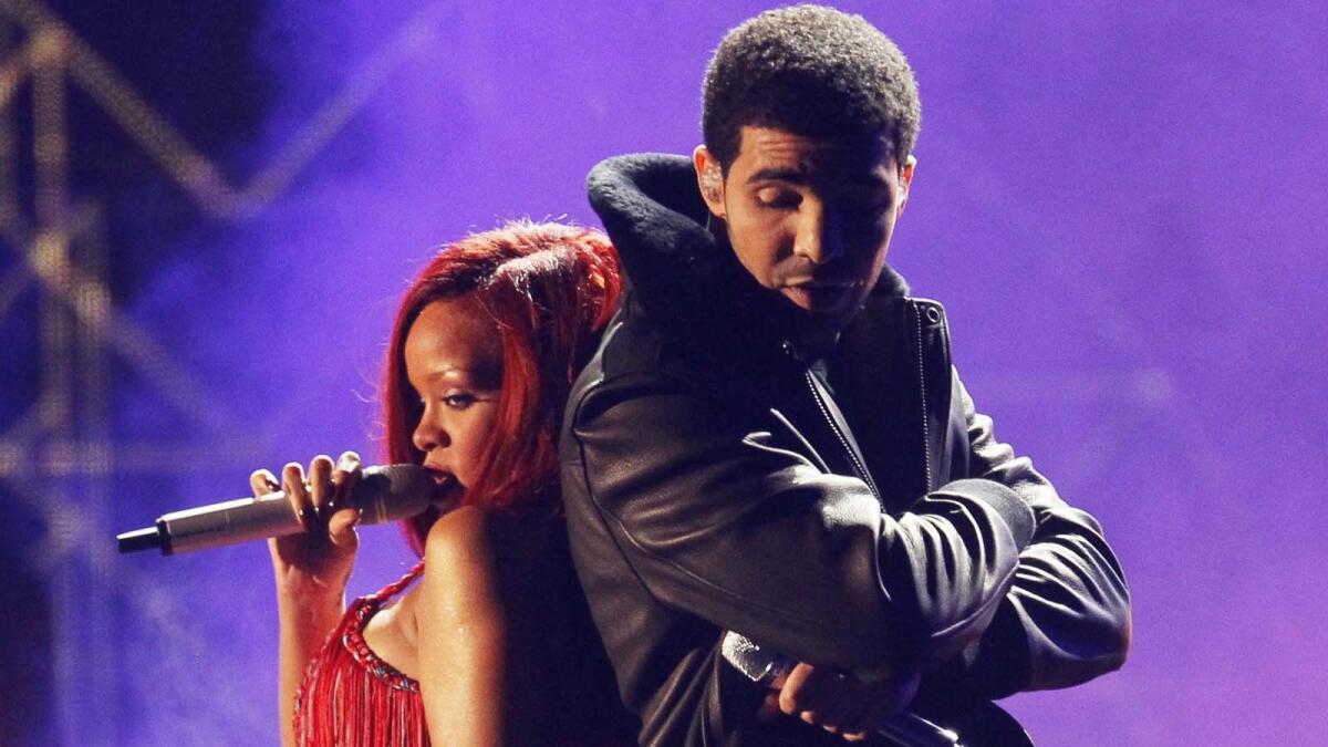 Rihanna and Drake perform at the Grammy Awards in 2011.