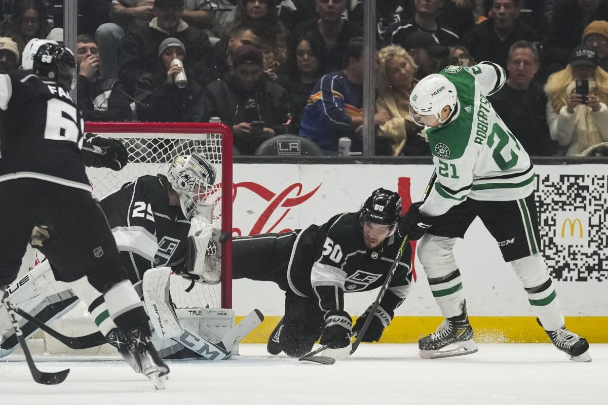 Dallas Stars left wing Jason Robertson scores against Kings goaltender Pheonix Copley.