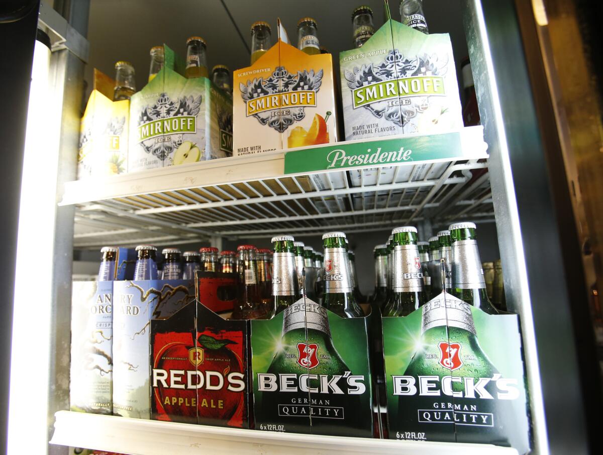 Beer and other alcoholic drinks are for sale in a Miami Beach liquor store. A new study shows continuing declines in teen drinking, and researchers say one likely reason is that alcohol has become more difficult for them to get.