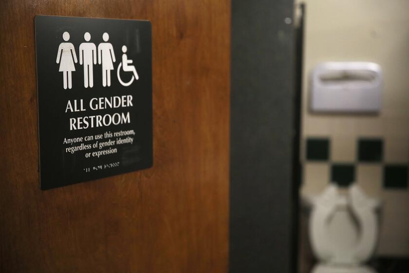 Multiple toilets at SOMArts Cultural Center have all gender restroom access in San Francisco, California, on Friday, January 8, 2015. Next Tuesday supervisor David Campos will introduce legislation that requires the city to make all single-room bathrooms gender neutral as well. (Liz Hafalia/San Francisco Chronicle via AP)