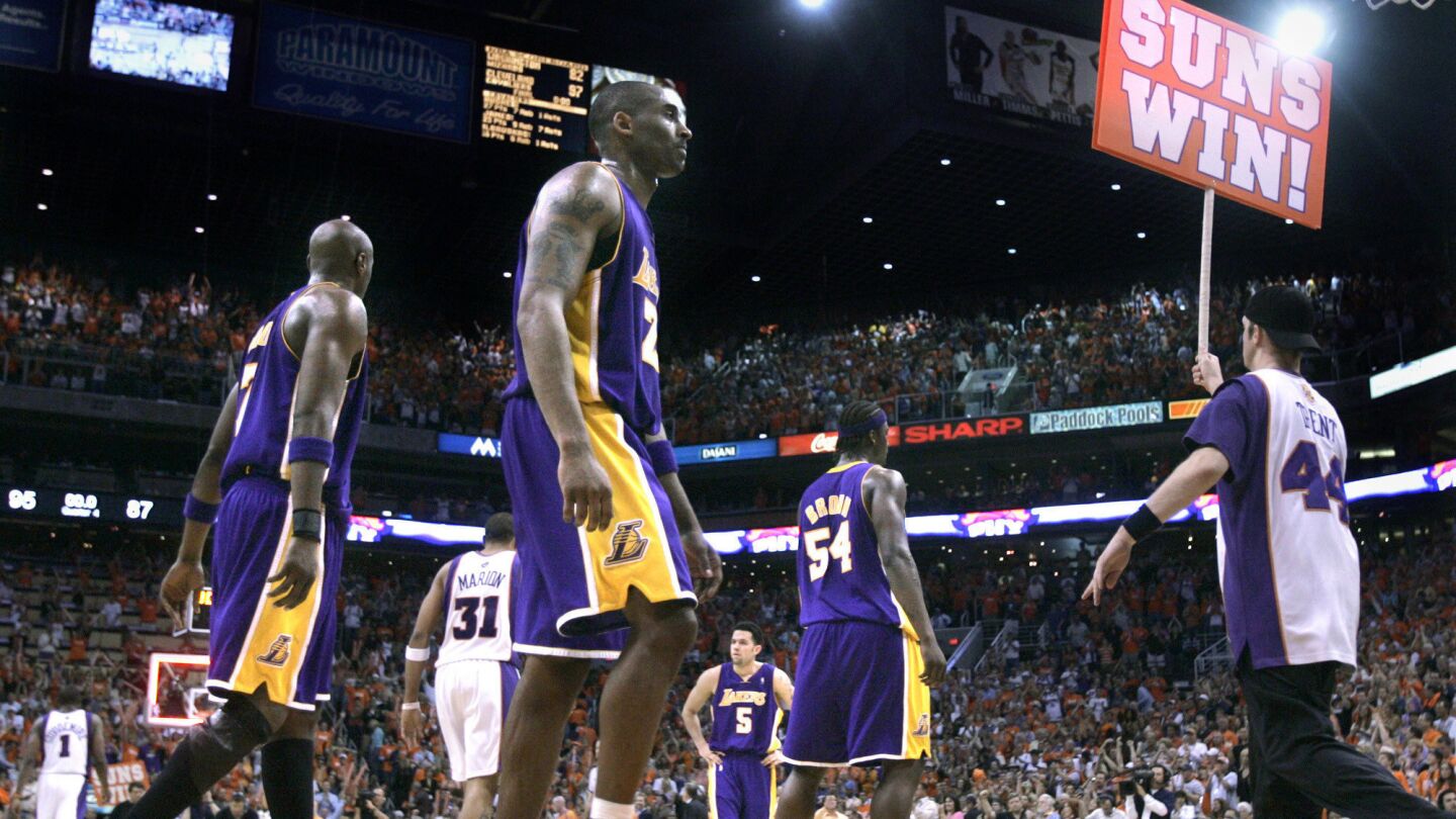 Lakers star Kobe Bryant walks off the court after losing to the Phoenix Suns in Game 1 of the 2007 NBA Western Conference quarterfinals.