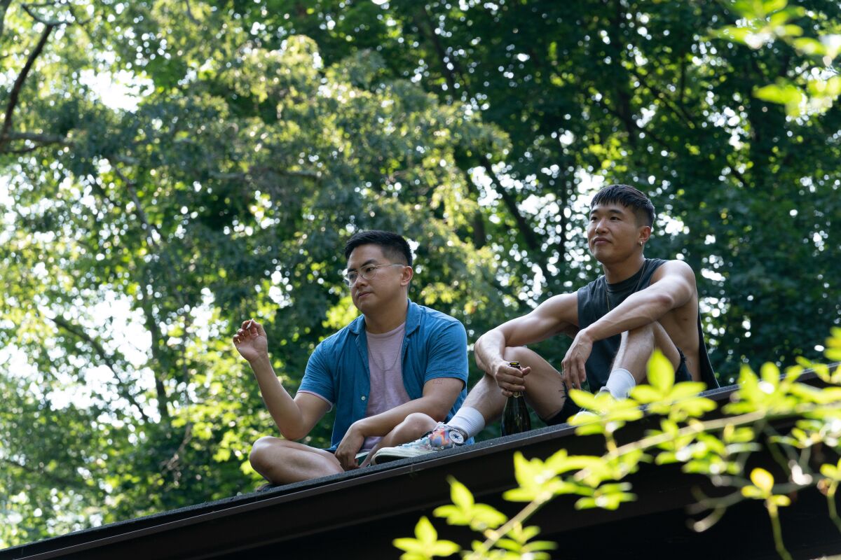 Bowen Yang and Joel Kim Booster in the film "Fire Island."