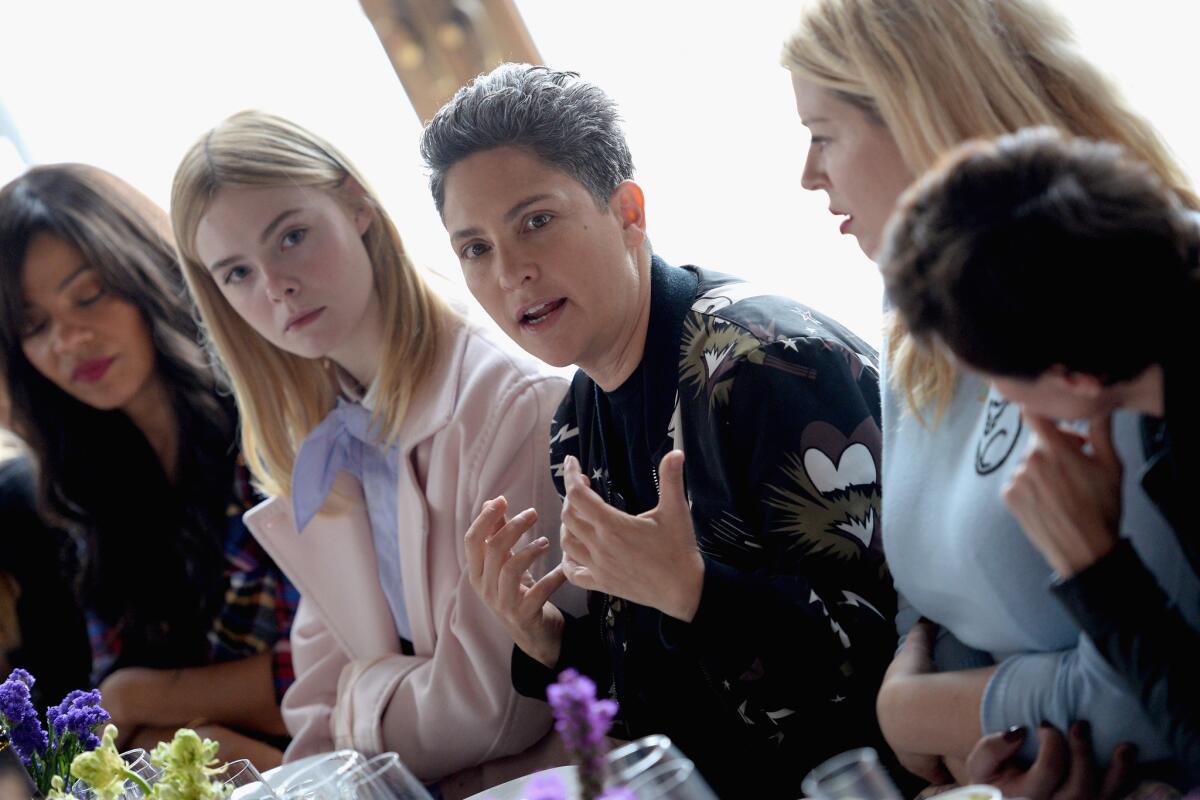 Elle Fanning, left, Jill Soloway, and Amanda de Cadenet.