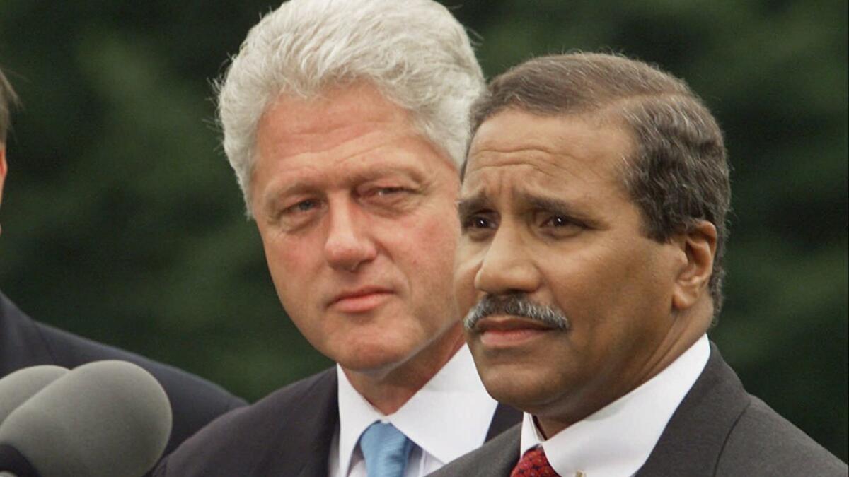 President Clinton with Veterans Affairs Secretary Togo D. West Jr. in 2000.