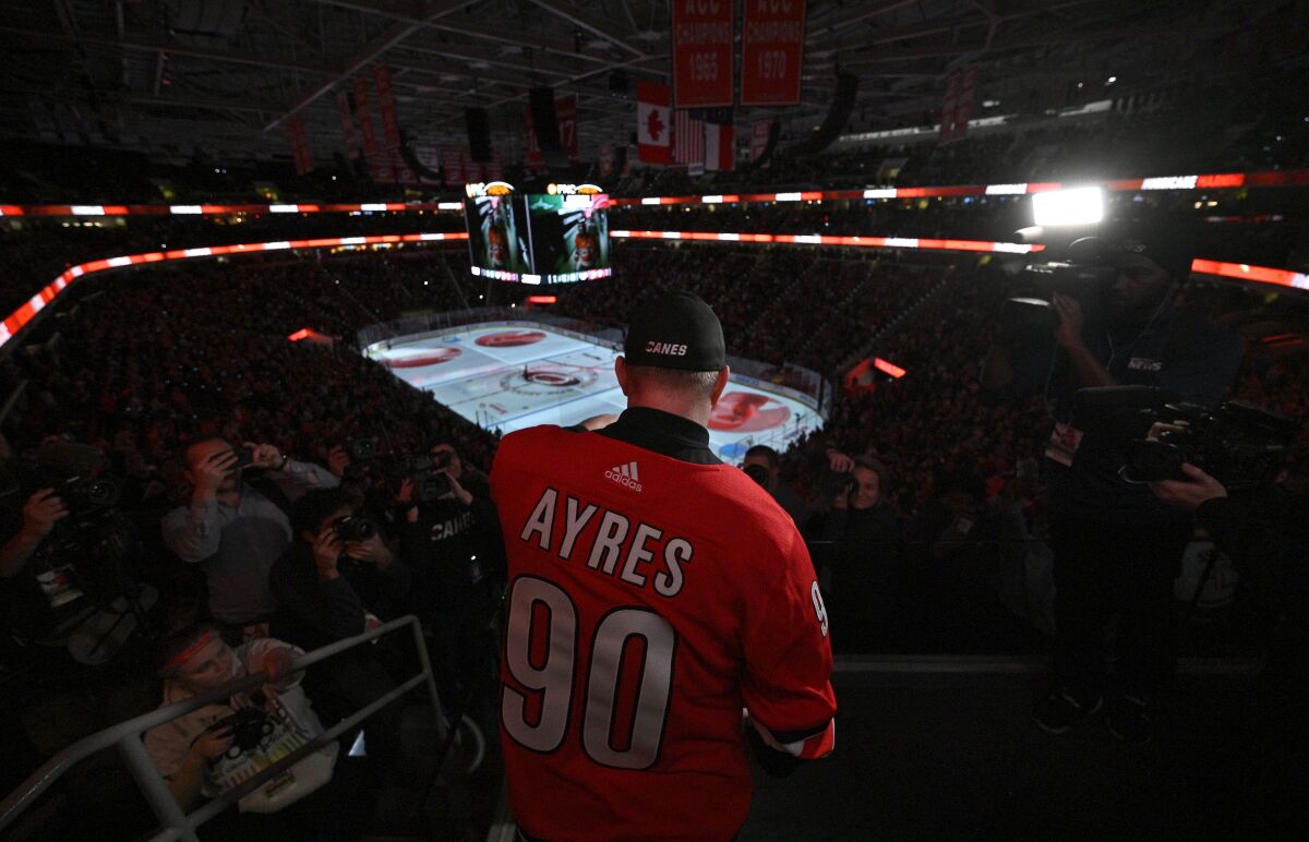 David Ayres sounds the siren before a game between the Dallas Stars and Carolina Hurricanes  on Feb. 25.