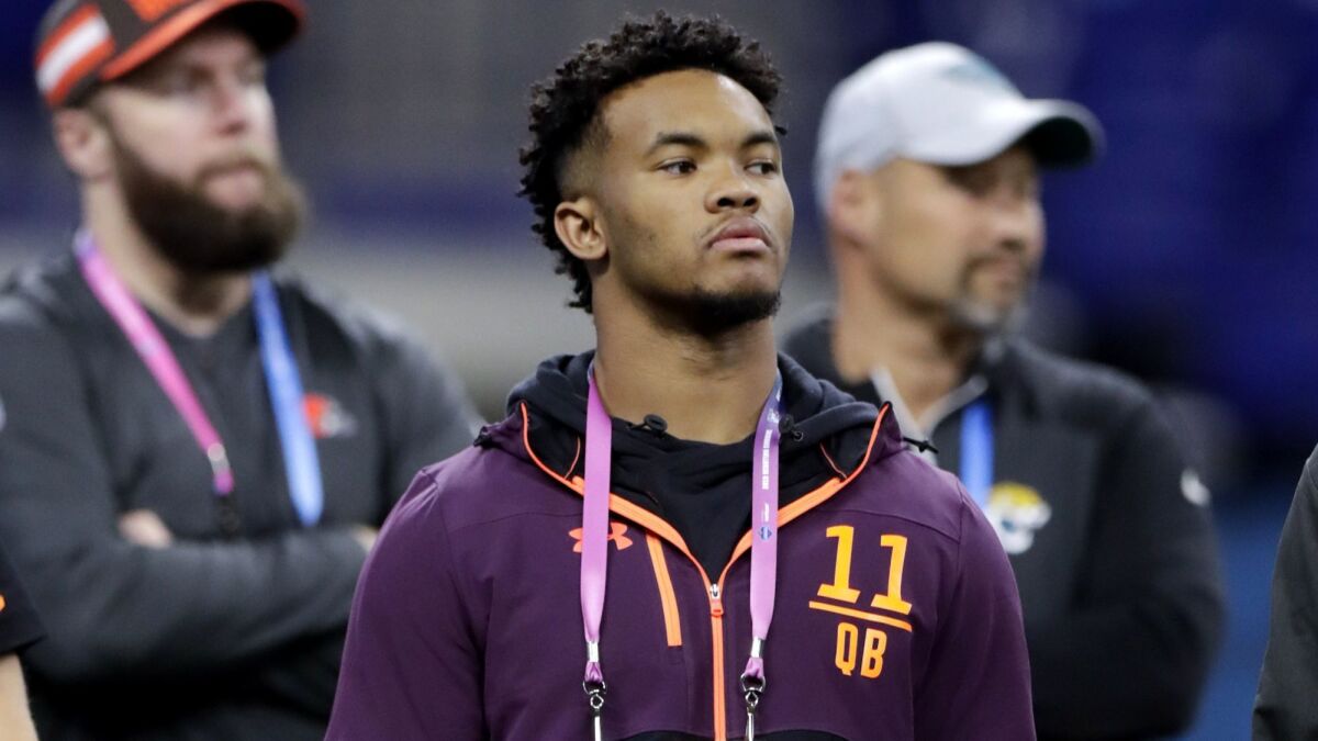 Oklahoma quarterback Kyler Murray watches a drill at the NFL scouting combine on Saturday.