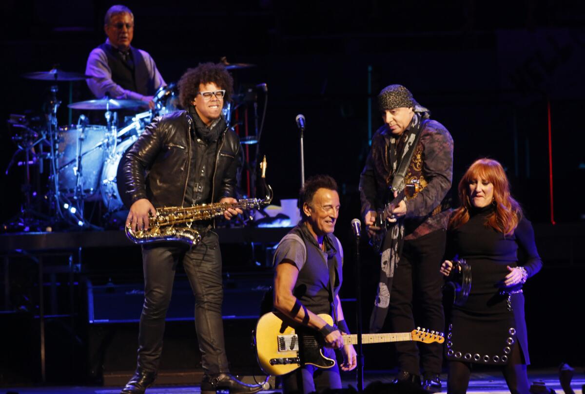 Max Weinberg, Jake Clemons, Bruce Springsteen, Steven Van Zandt and Patti Scialfa share the stage at the Los Angeles Sports Arena on March 15.
