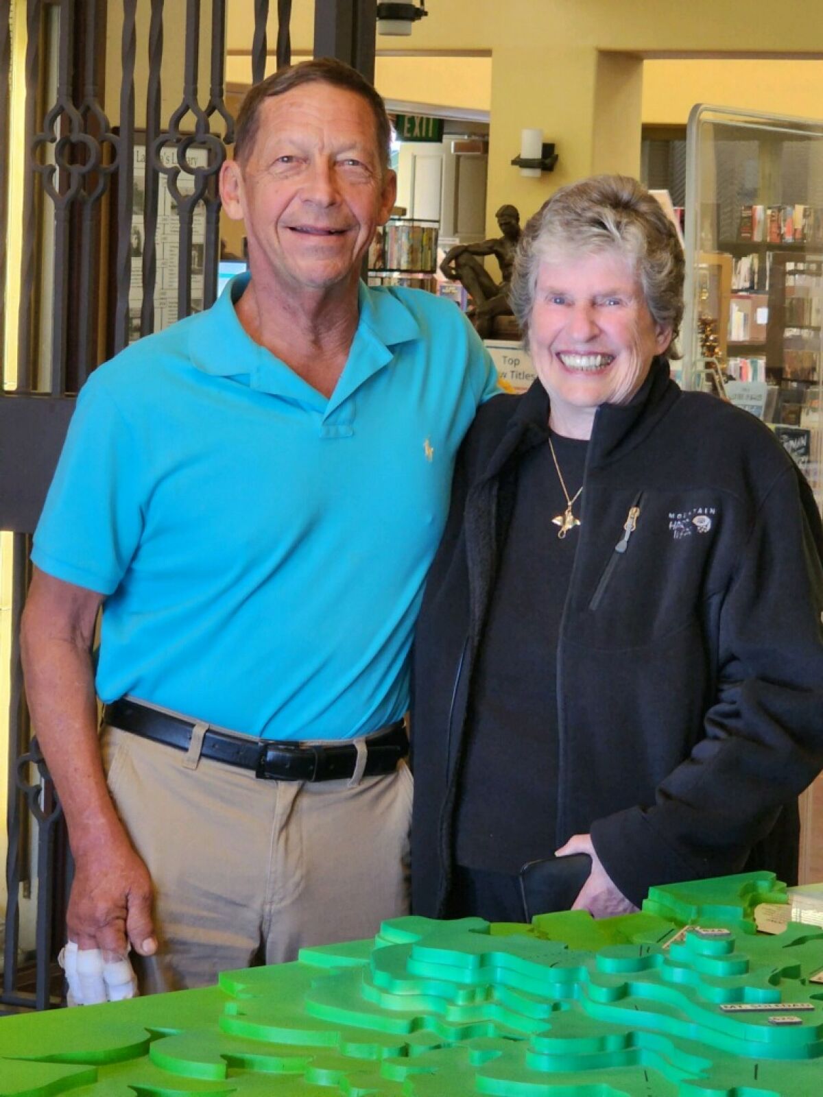 Sculptor Carl Glowienke stands with Mary Coakley Munk, president of the Walter Munk Foundation for the Oceans.