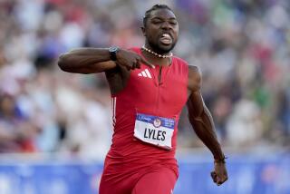 Noah Lyles celebrates after winning the men's 100-meter final during the U.S. Track.
