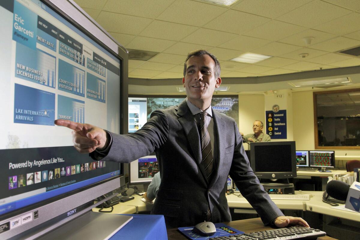 Los Angeles Mayor Eric Garcetti, marks his 100th day in office with a sneak peek of his city government "performance metric" beta website, which will be used to measure the progress and performance of city departments, during a news conference inside the Automated Traffic Surveillance and Control Center in Los Angeles.