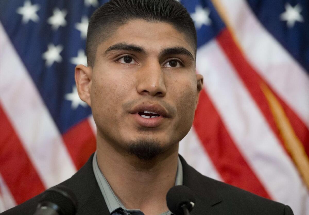 World champion boxer Mikey Garcia of Oxnard speaks at a new conference where professional boxing and fighting organizations announced they would pledge $600,000 in support of the Professional Fighters Brain Health Study at the Cleveland Clinic.