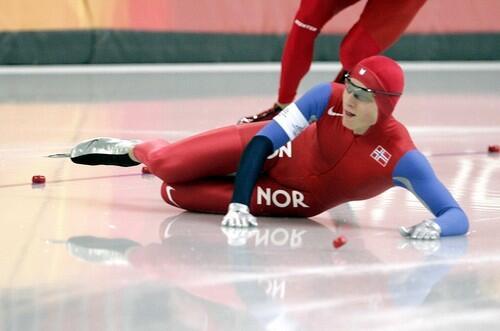 Norway's Havard Bokko falls on ice during the Winter Olympics men's 1,500 meter speedskating competition.