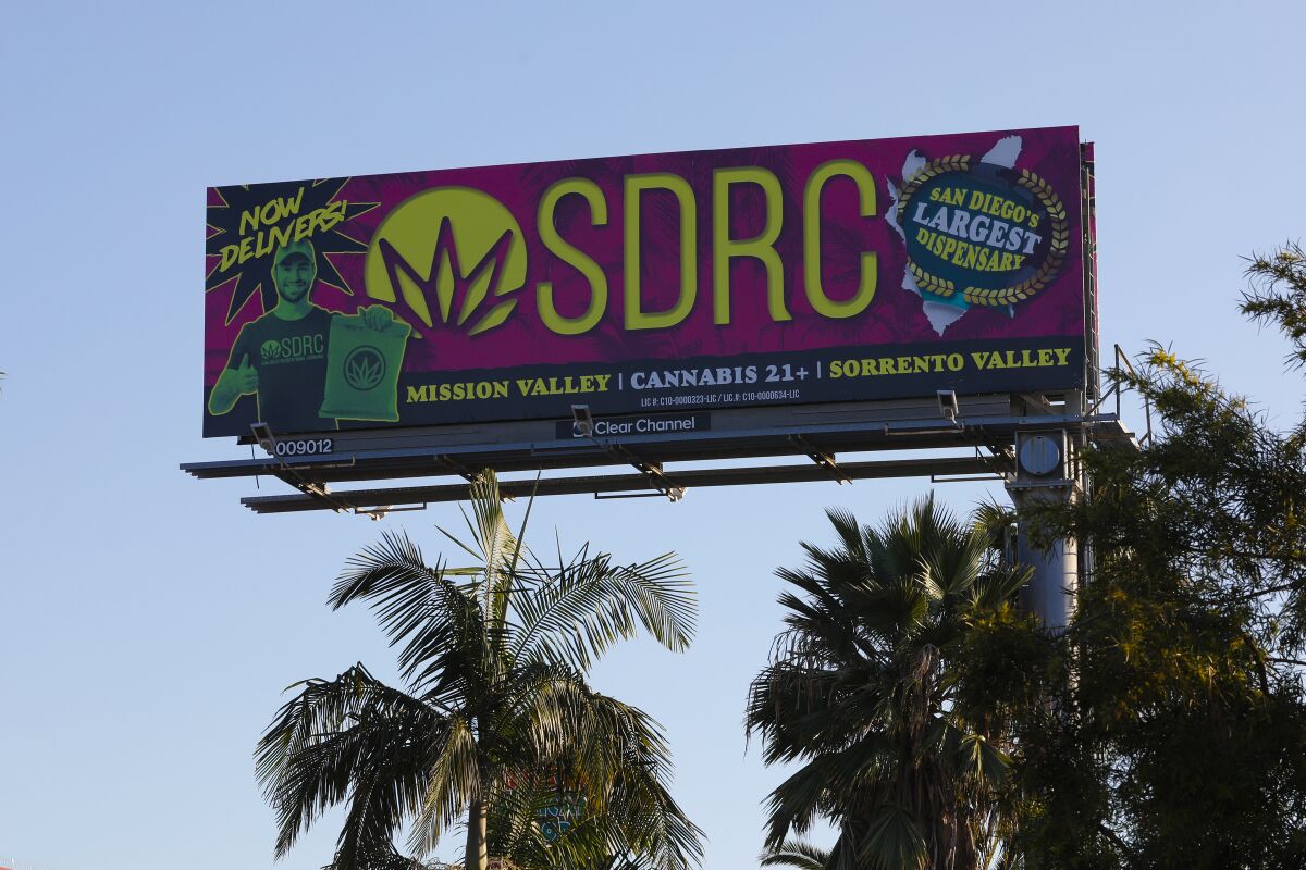 A billboard located on Rosecrans and Hancock Street advertises locations of cannabis dispensary in San Diego. The San Diego City Council has banned marijuana billboard ads within 1,000 feet of schools, playgrounds, day care centers, youth centers and public parks with playgrounds.
