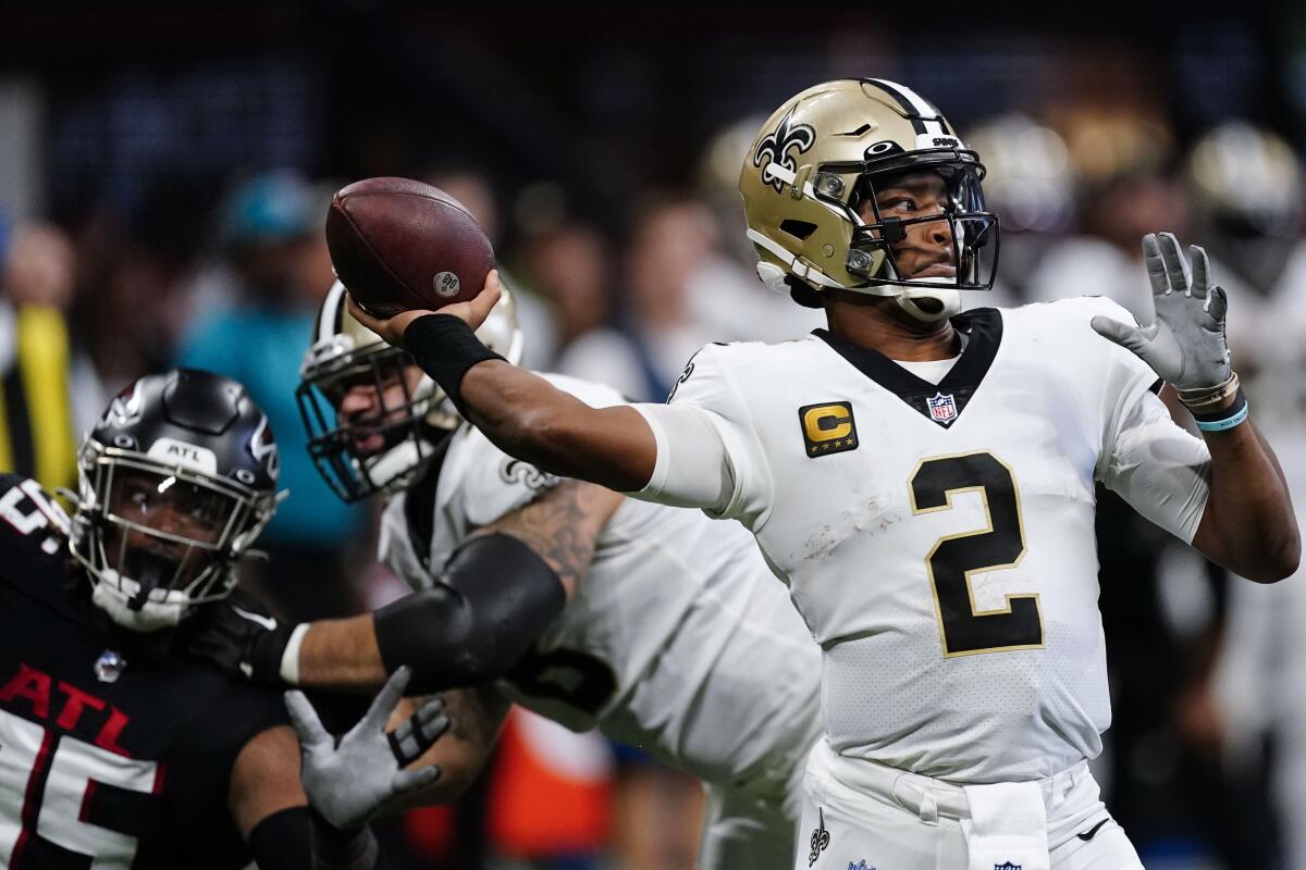 New Orleans Saints quarterback Jameis Winston (2) works in the pocket against the Atlanta Falcons during the first half of an NFL football game, Sunday, Sept. 11, 2022, in Atlanta. (AP Photo/John Bazemore)