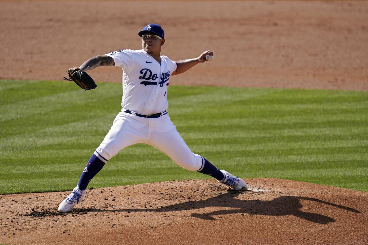 Dodgers starting pitcher Julio Urías delivers during the first inning Saturday.