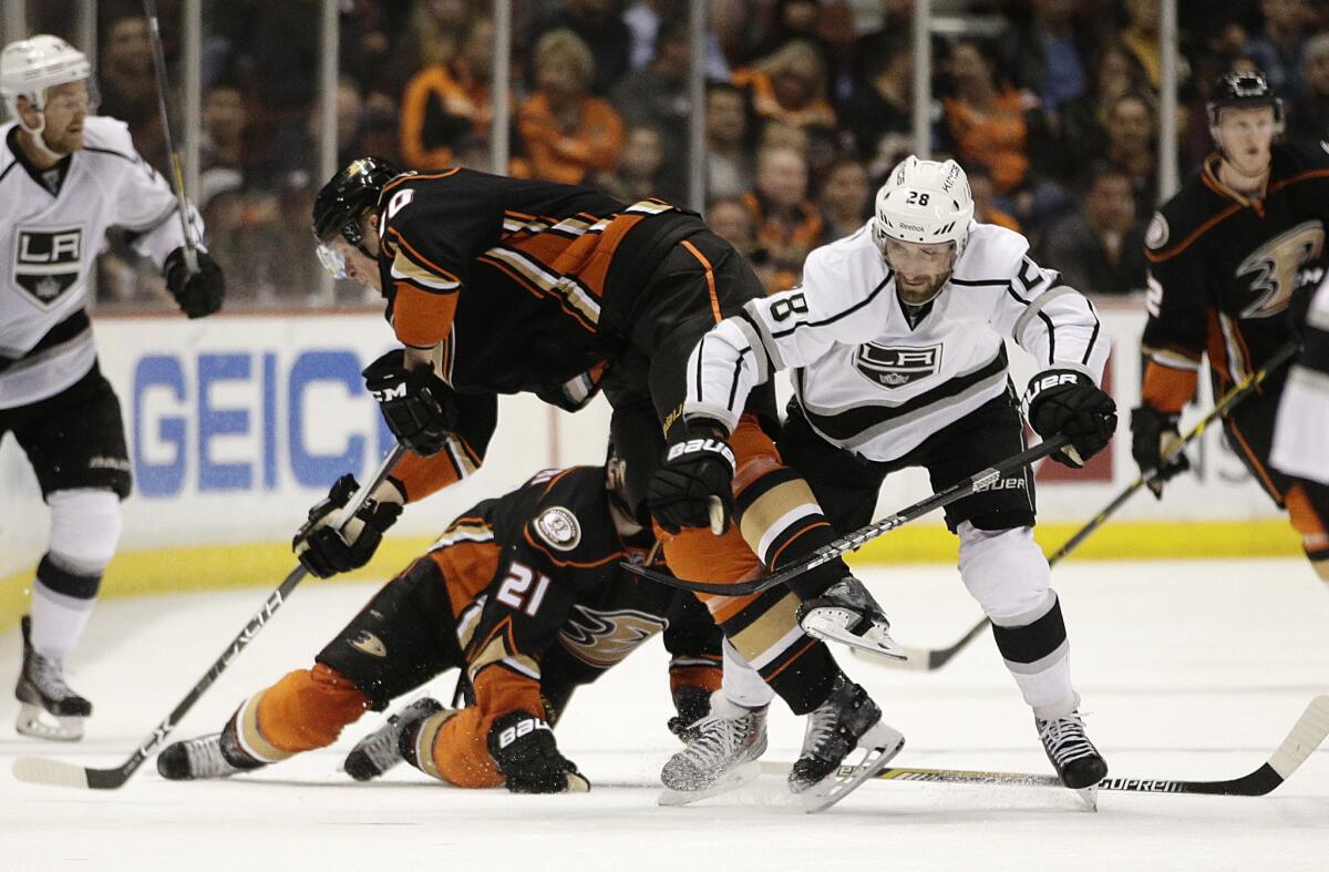 Kings forward Jarret Stoll collides with Ducks forward Corey Perry during the second period of a game on Feb. 27.