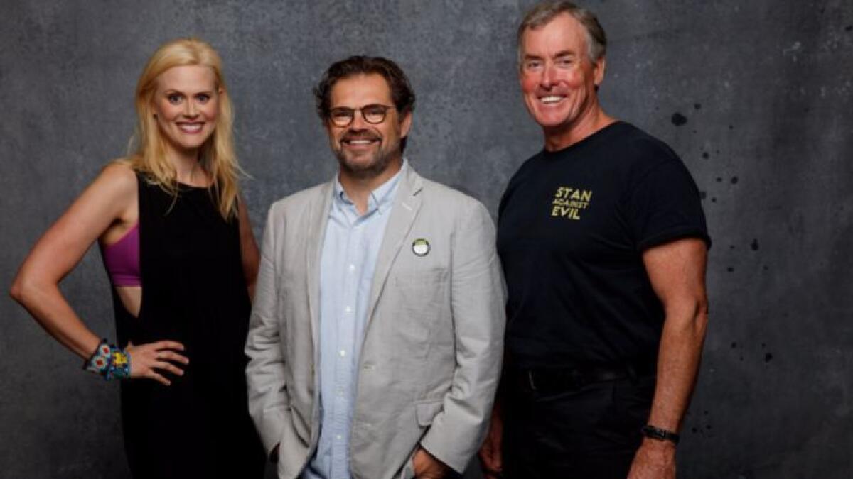 Actress Janet Varney, show creator Dana Gould, and actor John C. McGinley, from the IFC series "Stan Against Evil," photographed in the L.A. Times Hero Complex photo studio at Comic-Con 2017