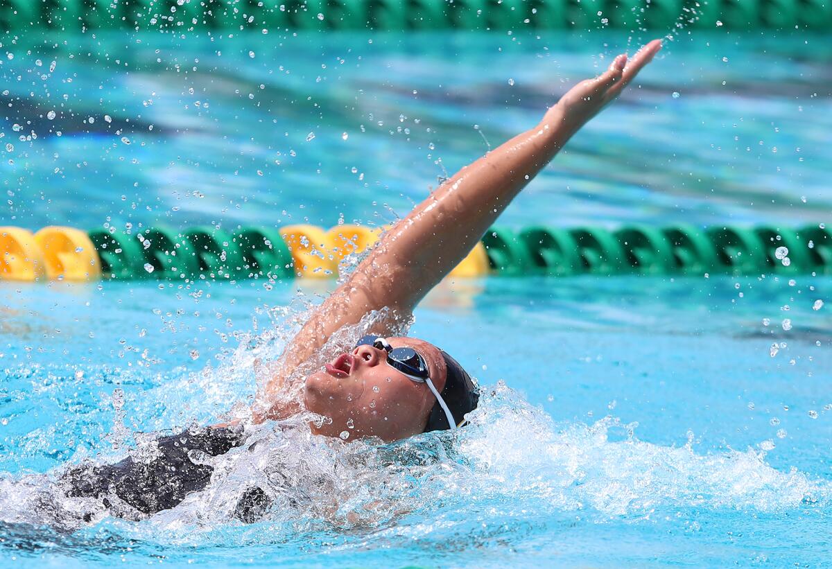 Fountain Valley's Alyssa Ton swims the backstroke leg of the girls' 200 yard medley relay on Thursday.