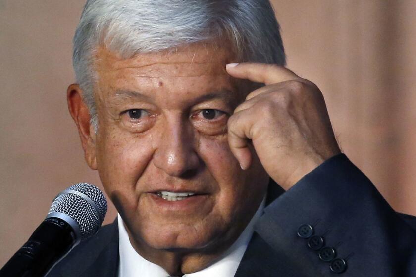 Mexico's President-elect Andres Manuel Lopez Obrador speaks to reporters after meeting with Mexico's President Enrique Pena Nieto at the National Palace in Mexico City, Tuesday, July 3, 2018. The president-elect met with the current leader to discuss his transition to office in December, aiming to ensure an orderly transfer of power after a heated and polarizing campaign. (AP Photo/Marco Ugarte)