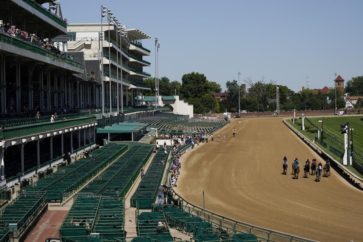 Horses finish the ninth race before the 146th running of the Kentucky Derby at Churchill Downs on Saturday.