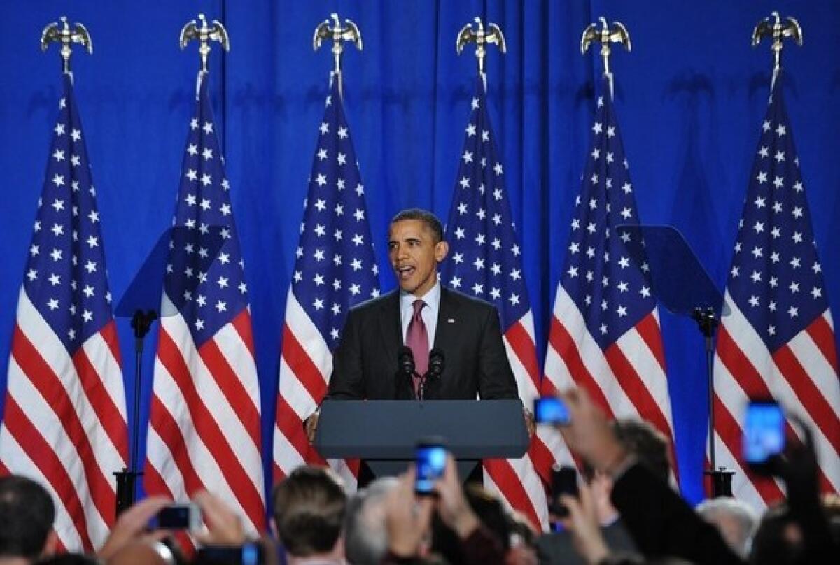 President Obama arrives on stage to speak at a campaign fundraiser at the Sheraton Hotel on Nov. 30, 2011 in New York.