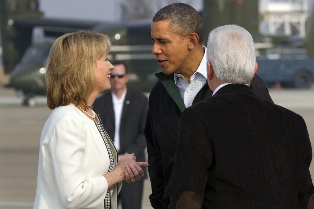 Fresno Mayor Ashley Swearengin, left, greeted President Obama last month when he visited Fresno to discuss California's ongoing drought. Swearengin filed as a candidate for the state controller's office this week.