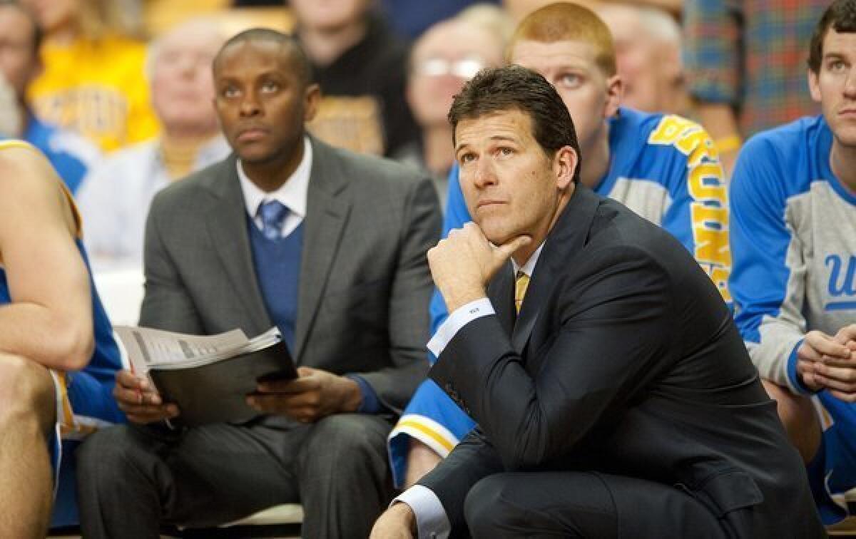 UCLA Coach Steve Alford, right, watches his team play against Missouri on Dec. 7. The Bruins lost to the Tigers, 80-71.