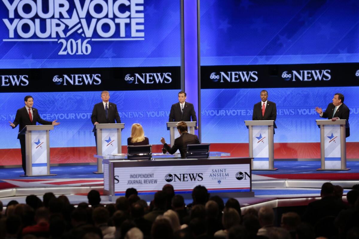 Republican presidential candidates spar at the St. Anselm College GOP debate on Feb. 6, in Manchester, N.H.