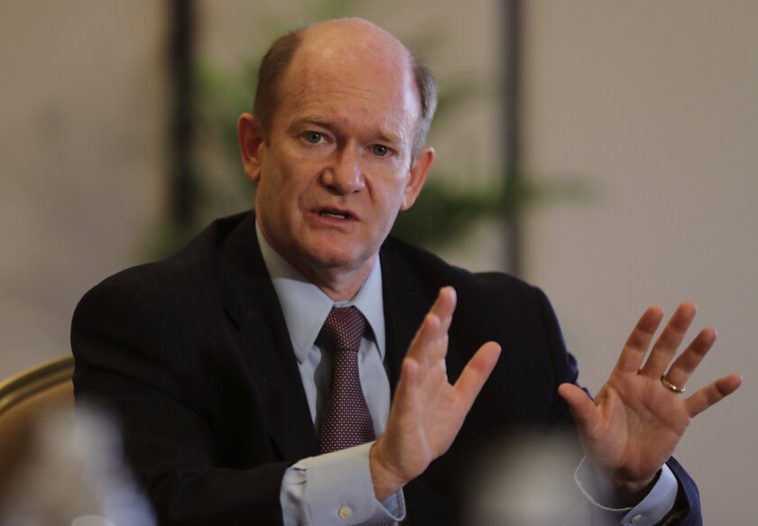 Senator Chris Coons of Delaware talks to the journalists during a press briefing in Abu Dhabi, United Arab Emirates, Monday, May 3, 2021. Top Biden administration officials and U.S. senators crisscrossed the Middle East on Monday, seeking to assuage growing unease among Gulf Arab partners over America’s rapprochement with Iran and other policy shifts in the region. (AP Photo/Kamran Jebreili)