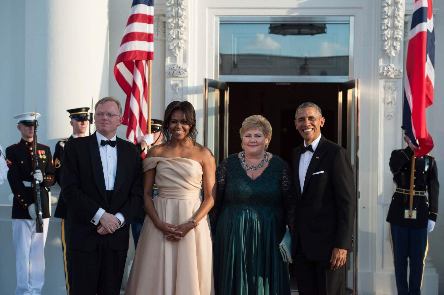 Norwegian Prime Minister Erna Solberg, right, and her husband Sindre Finnes pose for a photo with President Obama and First Lady Michelle Obama at the White House on May 13, 2016.