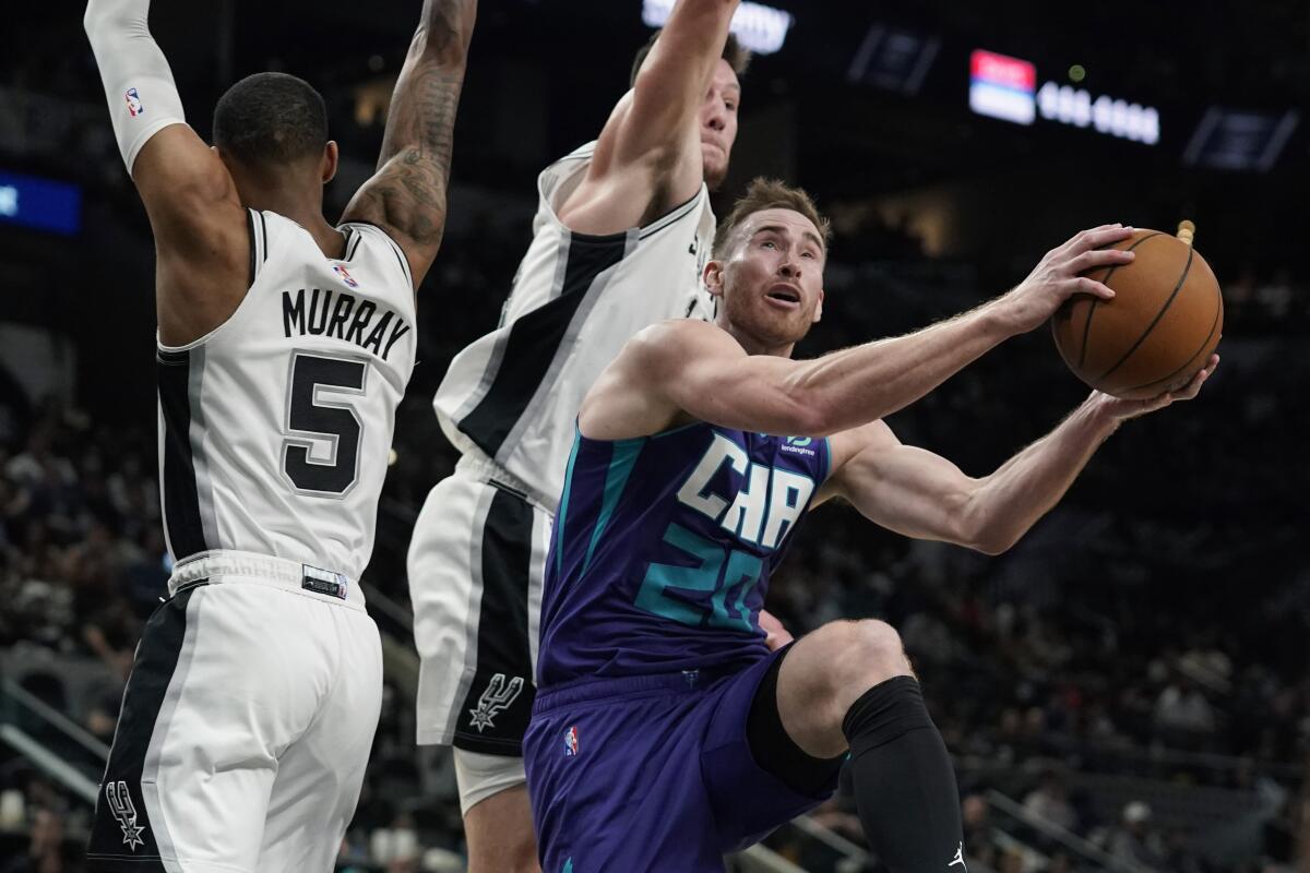 Charlotte Hornets' LaMelo Ball, San Antonio Spurs' Dejounte Murray